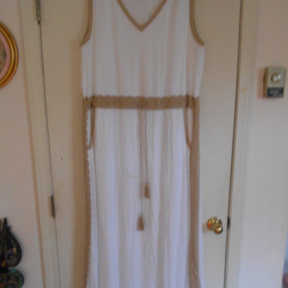 Beautiful white long dress with tan lace / lining.